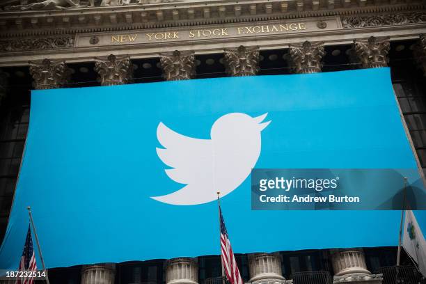 The Twitter logo is displayed on a banner outside the New York Stock Exchange on November 7, 2013 in New York City. Twitter goes public on the NYSE...