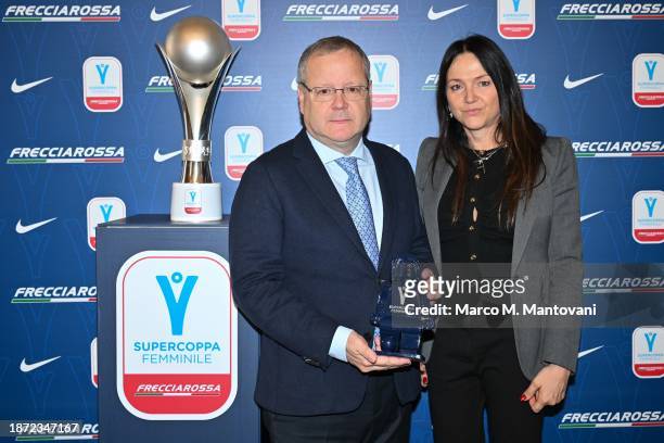 Federica Cappelletti gives a present to Paolo Armenia during the Women Italia Super Cup Press Conference on December 21, 2023 in Cremona, Italy.