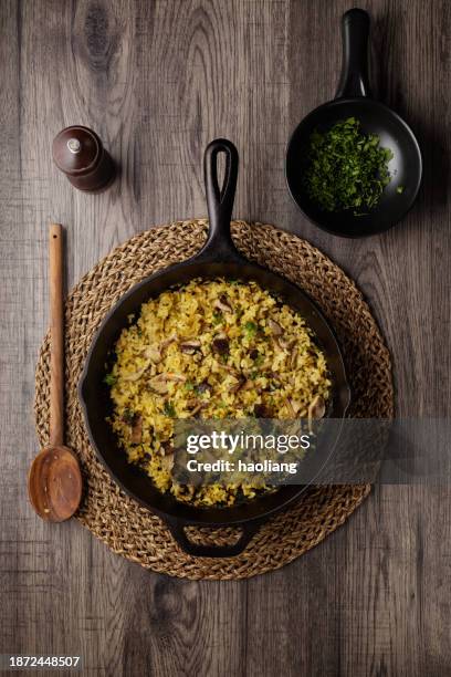 one pan baked shiitake mushroom rice for vegan diet - pilau rice stock pictures, royalty-free photos & images