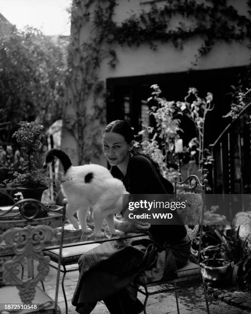 Fashion designer L'Wren Scott in the garden of her Hollywood Hills home.