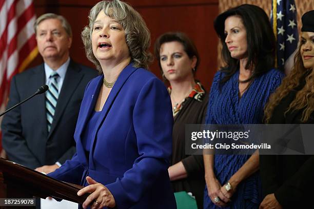 National Right to Life Committee President Carol Tobias and other anti-abortion leaders show their support for Sen. Lindsey Graham during a news...
