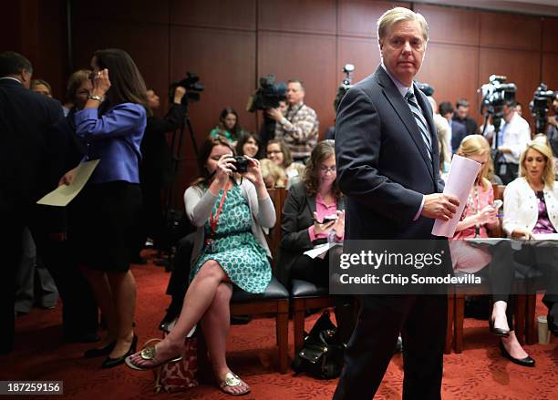 Sen. Lindsey Graham arrives at a news conference to introduce new legislation, the Pain-Capable Unborn Child Protection Act, at the U.S. Capitol...