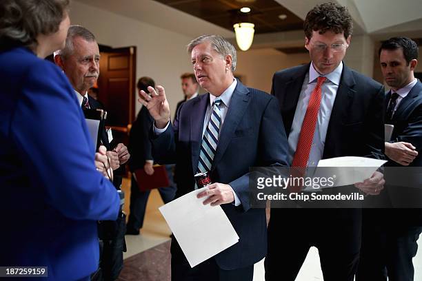 Sen. Lindsey Graham arrives at a news conference to introduce new legislation, the Pain-Capable Unborn Child Protection Act, at the U.S. Capitol...