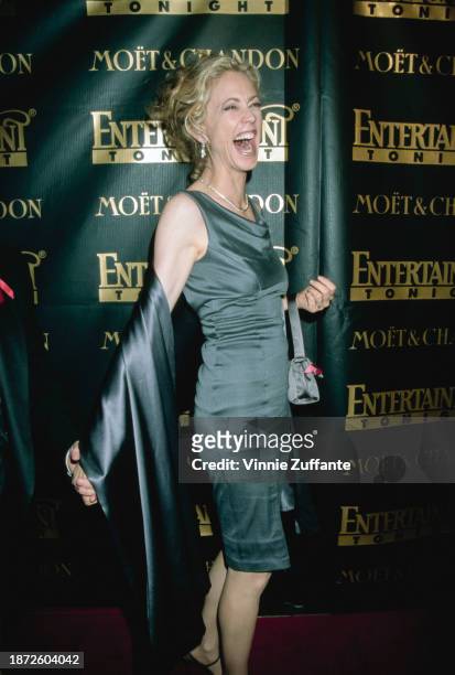 American actress Ally Walker, wearing a grey dress with a grey shawl, attends Entertainment Tonight's 3rd Annual Post-Emmy Bash, held at Cicada...