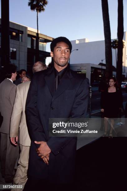 American basketball player Kobe Bryant attends the Beverly Hills premiere of 'The Mask of Zorro', held at the Academy Theater in Beverly Hills,...