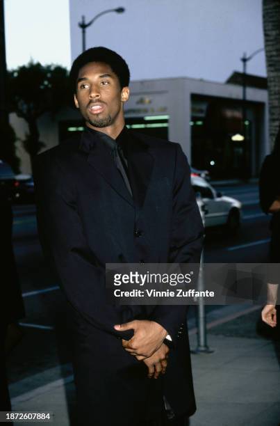 American basketball player Kobe Bryant attends the Beverly Hills premiere of 'The Mask of Zorro', held at the Academy Theater in Beverly Hills,...