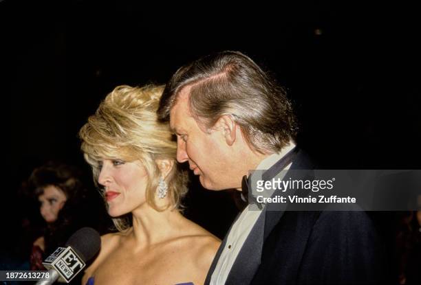 American actress Marla Maples and American businessman Donald Trump interviewed by Entertainment Tonight at the 1992 Soap Opera Digest Awards, held...