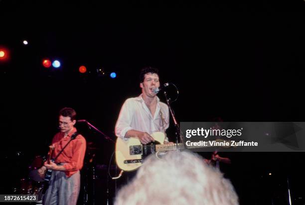 American singer, songwriter and musician Marshall Crenshaw alongside American singer, songwriter and musician Steve Forbert in concert, United...