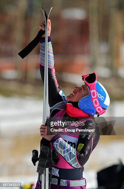 Stacey Cook collects her skis during downhill training at the U.S. Ski Team Speed Center at Copper Mountain on November 7, 2013 in Copper Mountain,...