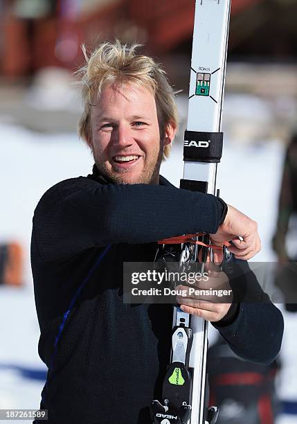 Andrew Wiebrecht collects his skis following downhill training at the U.S. Ski Team Speed Center at Copper Mountain on November 7, 2013 in Copper...