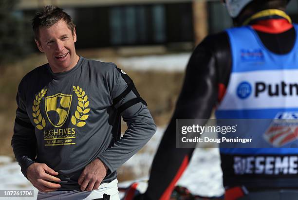 Marco Sullivan talks with Tommy Biesemeyer following downhill training at the U.S. Ski Team Speed Center at Copper Mountain on November 7, 2013 in...
