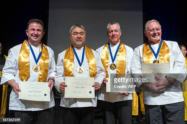 Chefs Martin Berasetegui of Spain, Kiomy Mikuni of Japan, Philippe Rochat of Switzerland and Pierre Wynants of Belgium pose on November 7, 2013 at...