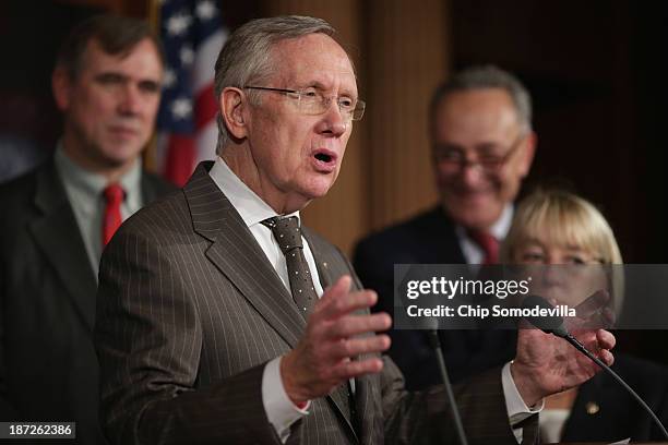 Senate Majority Leader Harry Reid speaks during a news conference before the final passage of the Employment Non-Discrimination Act with Sen. Jeff...