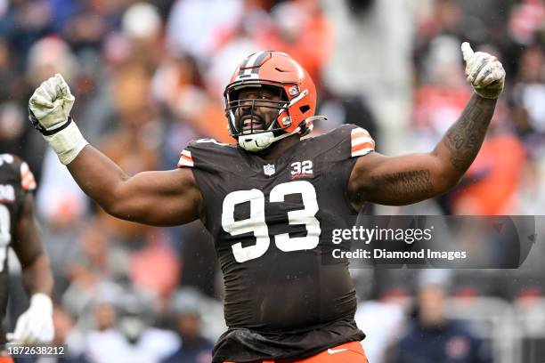 Shelby Harris of the Cleveland Browns celebrates a tackle for loss during the second half against the Chicago Bears at Cleveland Browns Stadium on...