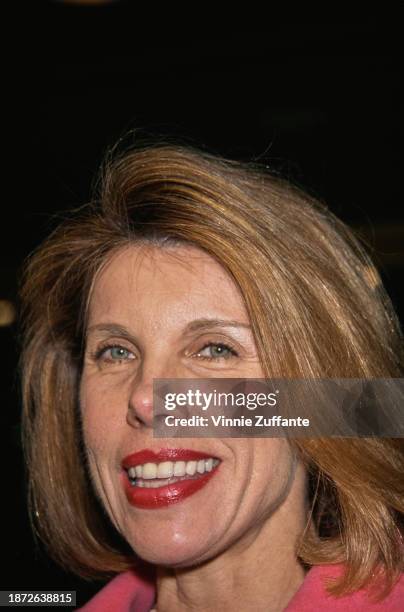 American actress and singer Christine Baranski, wearing a pink jacket, attends the Westwood premiere of 'The Evening Star', held at the Mann National...