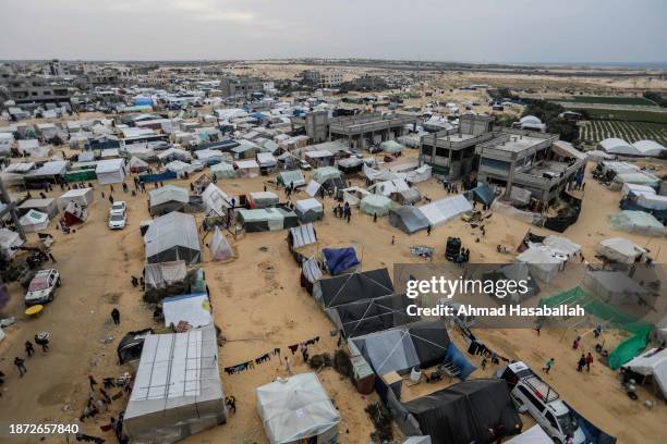 Displaced Palestinians are pictured along with makeshift tents in the so-called safe zone on December 21, 2023 in Al-Mawasi, Rafah, Gaza. Israel...