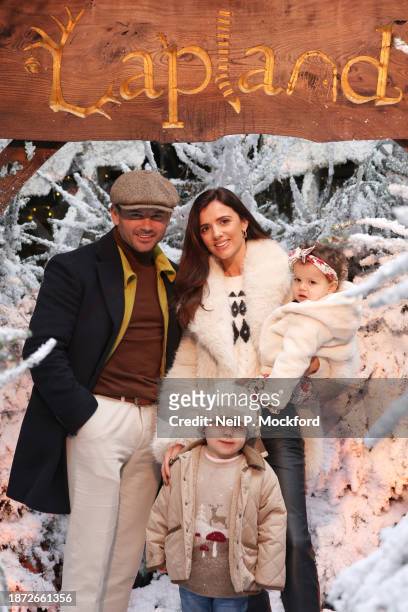 Lucy Mecklenburgh and Ryan Thomas with their children Roman and Lilah Rae visit LaplandUK at Whitmoor Forest on December 21, 2023 in Windsor, England.