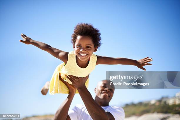 helping his daughter soar! - arms outstretched bildbanksfoton och bilder