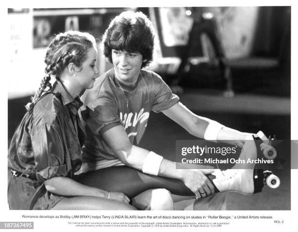 Actress Linda Blair and actor Jim Bray on set of the United Artist movie "Roller Boogie" in 1979.