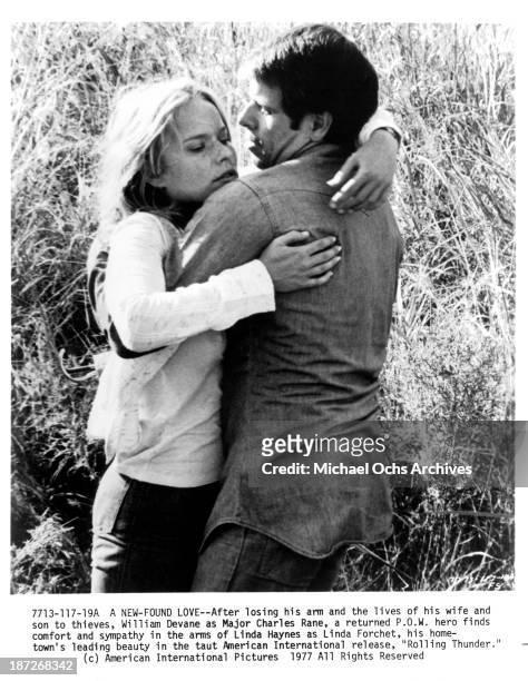 Actress Linda Haynes and actor William Devane on set for the American International Pictures movie "Rolling Thunder" in 1977.