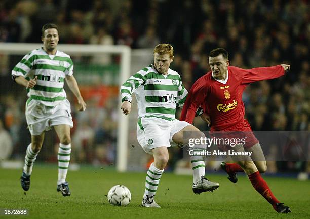 Neil Lennon of Celtic shields the ball from Vladimir Smicer of Liverpool during the UEFA Cup Quarter-Final second leg match held on March 20, 2003 at...