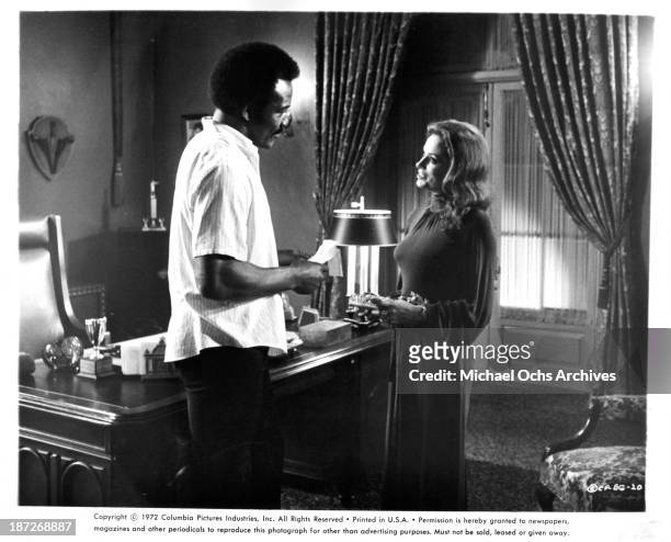 Actor Jim Brown and actress Luciana Paluzzi on set of the Columbia Pictures movie "Black Gunn" in 1972.