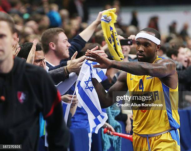 Tyrese Rice, #4 of Maccabi Electra Tel Aviv celebrates at the end of the 2013-2014 Turkish Airlines Euroleague Regular Season Date 4 game between...