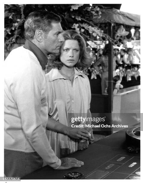 Actor James Franciscus and actress Gretchen Corbett on set of the movie "Secrets of Three Hungry Wives" in 1978