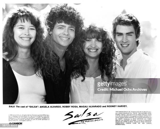 Actress Angela Alvarado, actor Draco Rosa and actress Magali Alvarado, actor Rodney Harvey pose for the Cannon Films movie "Salsa" in 1988.