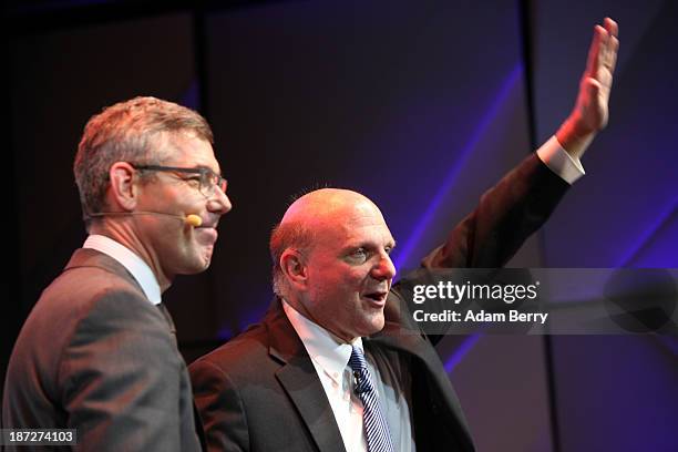 Christian Illek , head of Microsoft Germany, and Steve Ballmer, chief executive officer of Microsoft, speak at the opening of the Microsoft Center...