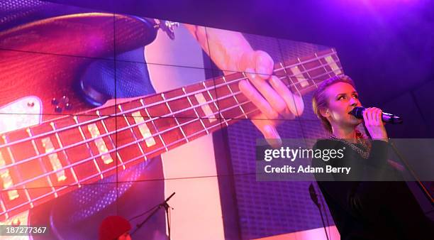 Singer Leslie Clio peforms at the opening of the Microsoft Center Berlin on November 7, 2013 in Berlin, Germany. The Microsoft Center Berlin, part of...