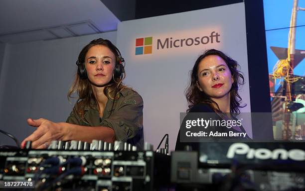 DJs play music at the opening of the Microsoft Center Berlin on November 7, 2013 in Berlin, Germany. The Microsoft Center Berlin, part of a new...