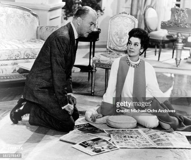 Actor Brian Aherne and actress Rosalind Russell on set of the Universal Studios movie "Rosie!" in 1967.