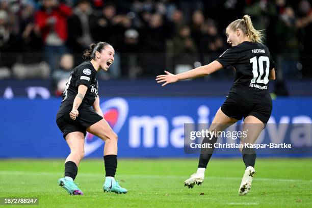 Geraldine Reuteler of Eintracht Frankfurt celebrates with teammate Laura Freigang after scoring their team's first goal during the UEFA Women's...