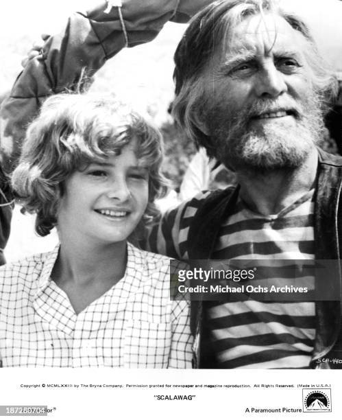 Actors Mark Lester and Kirk Douglas on set of the Paramount Pictures movie "Scalawag" in 1973.