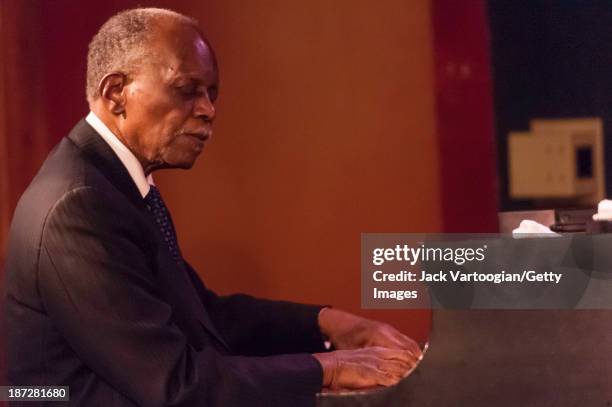 American Jazz composer, bandleader and musician Hank Jones plays piano as he performs in 'The Jazz Masters Salute the Broadway Masters' at the...