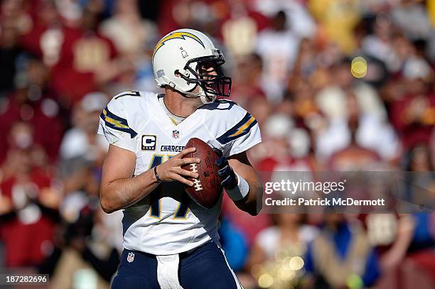 Philip Rivers of the San Diego Chargers drops back to throw a pass against the Washington Redskins during an NFL game at FedExField on November 3,...