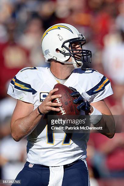 Philip Rivers of the San Diego Chargers drops back to throw a pass against the Washington Redskins during an NFL game at FedExField on November 3,...