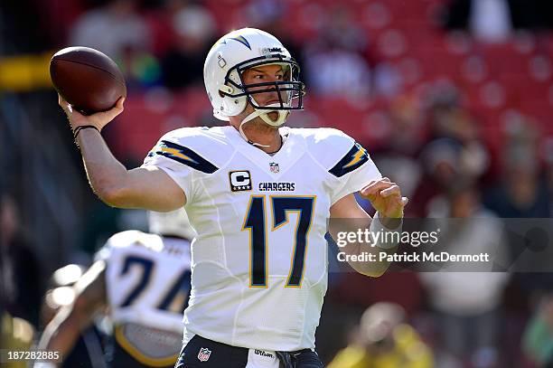 Philip Rivers of the San Diego Chargers warms up prior to the start of an NFL game against the Washington Redskins at FedExField on November 3, 2013...