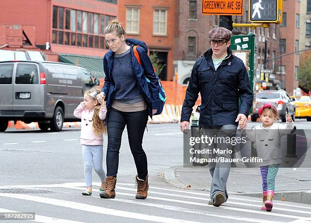 November 07: Matthew Broderick and his twin daughters, Tabitha Broderick and Loretta Broderick are seen in on November 07, 2013 in New York City.