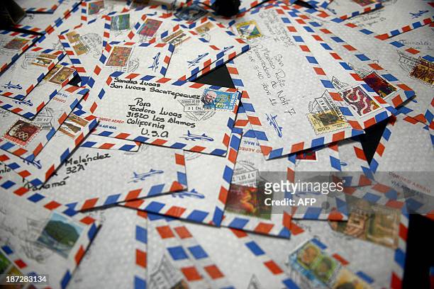 Lettera are seen at the Guatemalan mail service, El Correo, central post office in Guatemala City on November 7, 2013. AFP PHOTO/Johan ORDONEZ