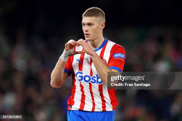 Artem Dovbyk of Girona FC celebrates after scoring their team's first goal from a penalty kick during the LaLiga EA Sports match between Real Betis...