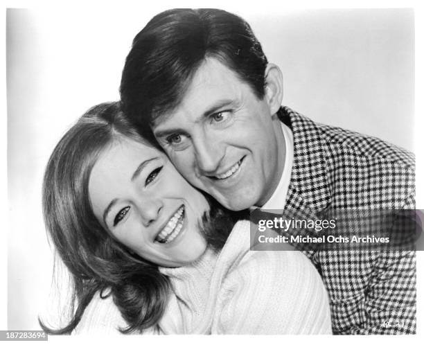 Actress Charlotte Rampling and actor Anton Rodgers on set of the movie "Rotten to the Core" in 1965.