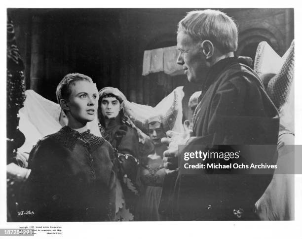 Actress Jean Seberg and actor Richard Widmark on set of the United Artist movie"Saint Joan" in 1957.