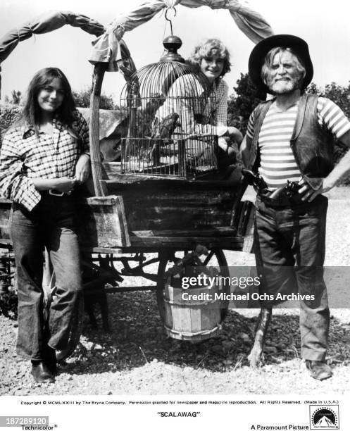 Actress Lesley-Anne Down with actors Mark Lester and Kirk Douglas on set of the Paramount Pictures movie "Scalawag" in 1973.