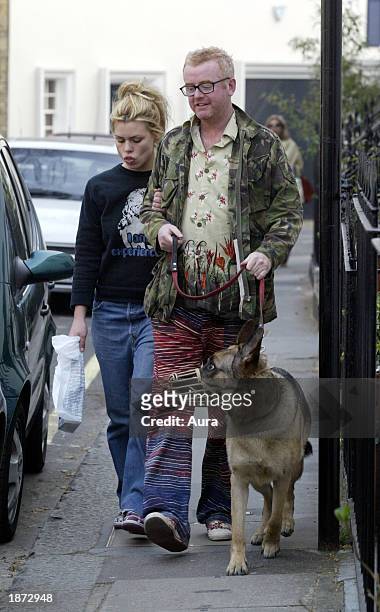 Former Virgin Radio presenter Chris Evans and wife Billie Piper return home after walking their dog March 26, 2003 in Central London.