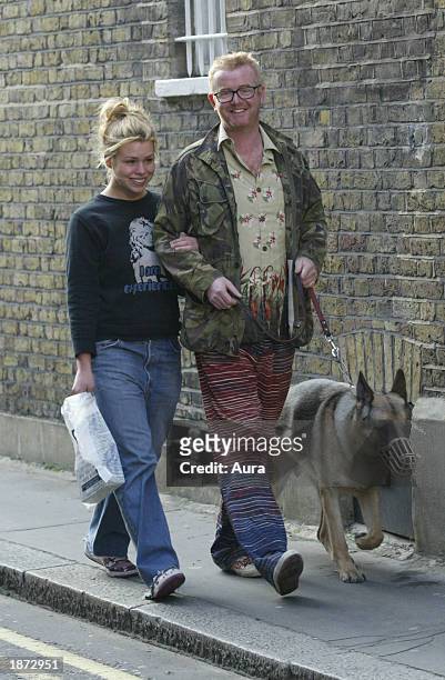 Former Virgin Radio presenter Chris Evans and wife Billie Piper return home after walking their dog March 26, 2003 in Central London.