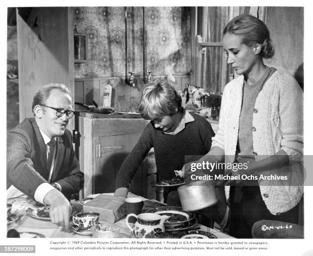 Actors Gordon Jackson, Mark Lester and actress Sylvia Syms on set of the Columbia Pictures movie "Run Wild, Run Free" in 1969.