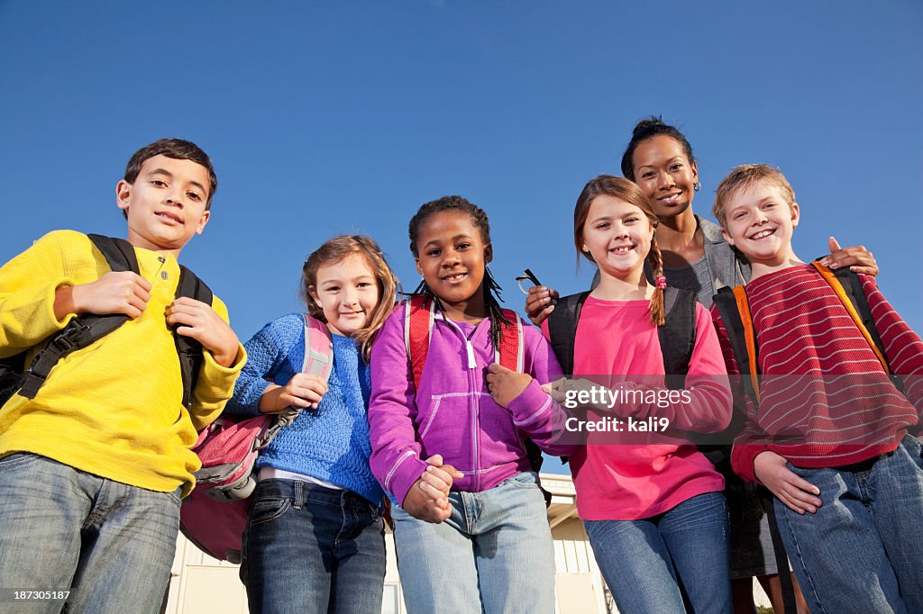 Group of elementary school children with teacher