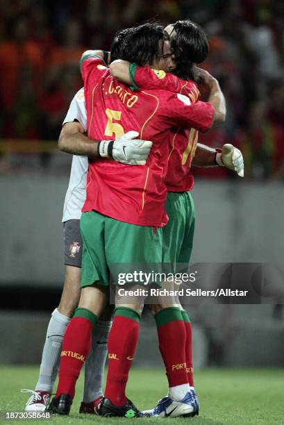 June 30: Fernando Couto of Portugal and Nuno Valente of Portugal celebrate during the UEFA Euro 2004 Semi Final match between Portugal and...